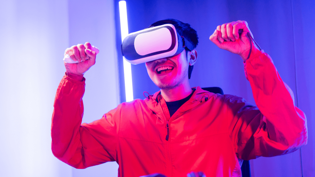 A man smiling while wearing his VR goggles